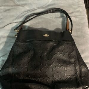 Coach Black and Gold Shoulder Bag with Structured Design